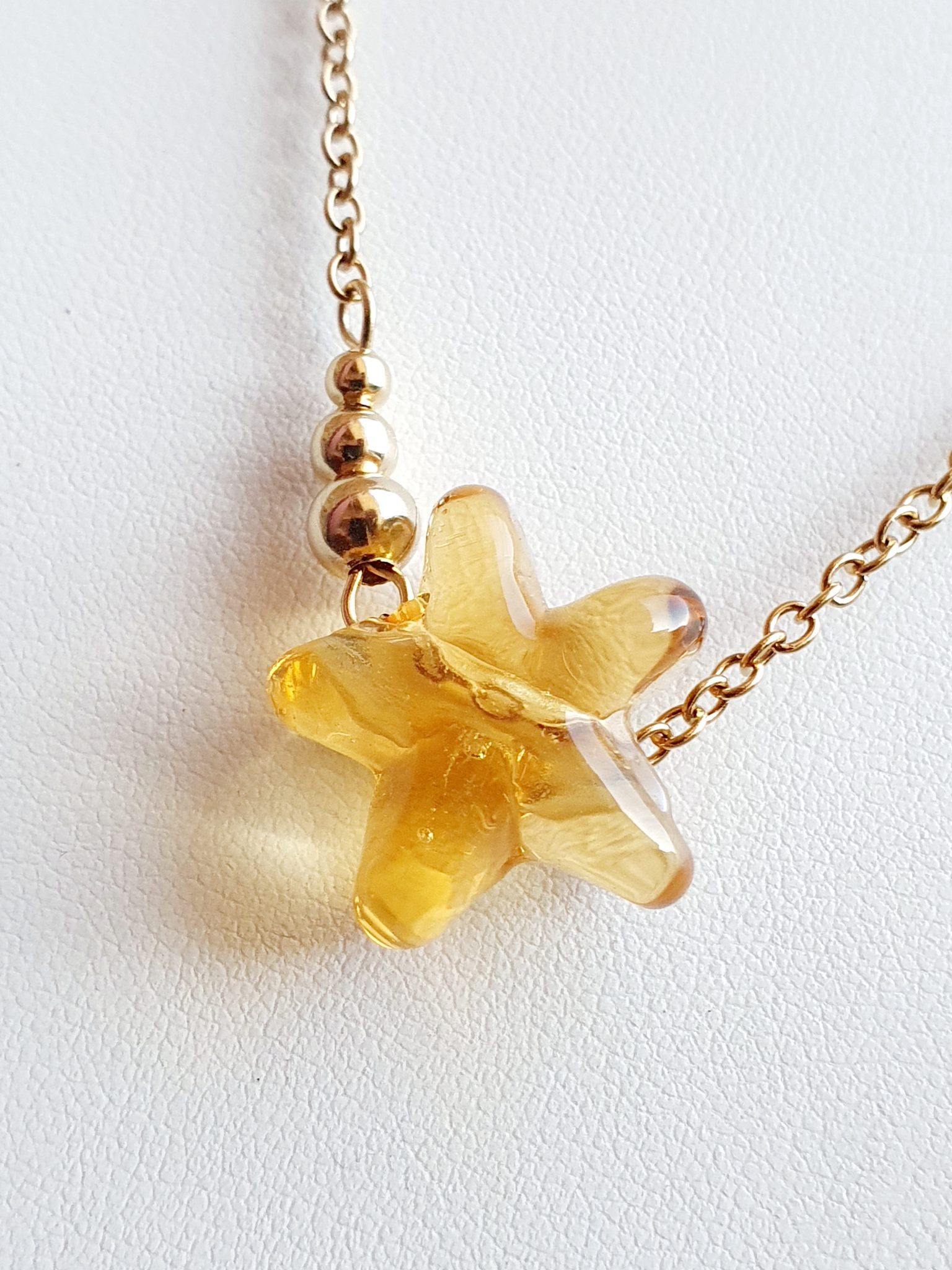 collier-etoile-filante-en-verre-de-murano-dore